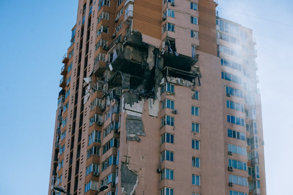 damaged building in Kyiv, Ukraine - Putin's sanity